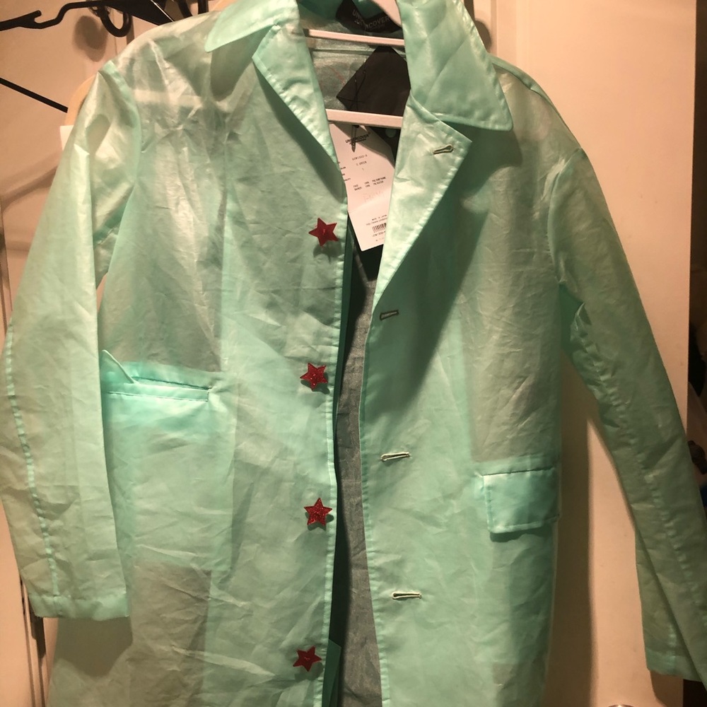 undercover green raincoat